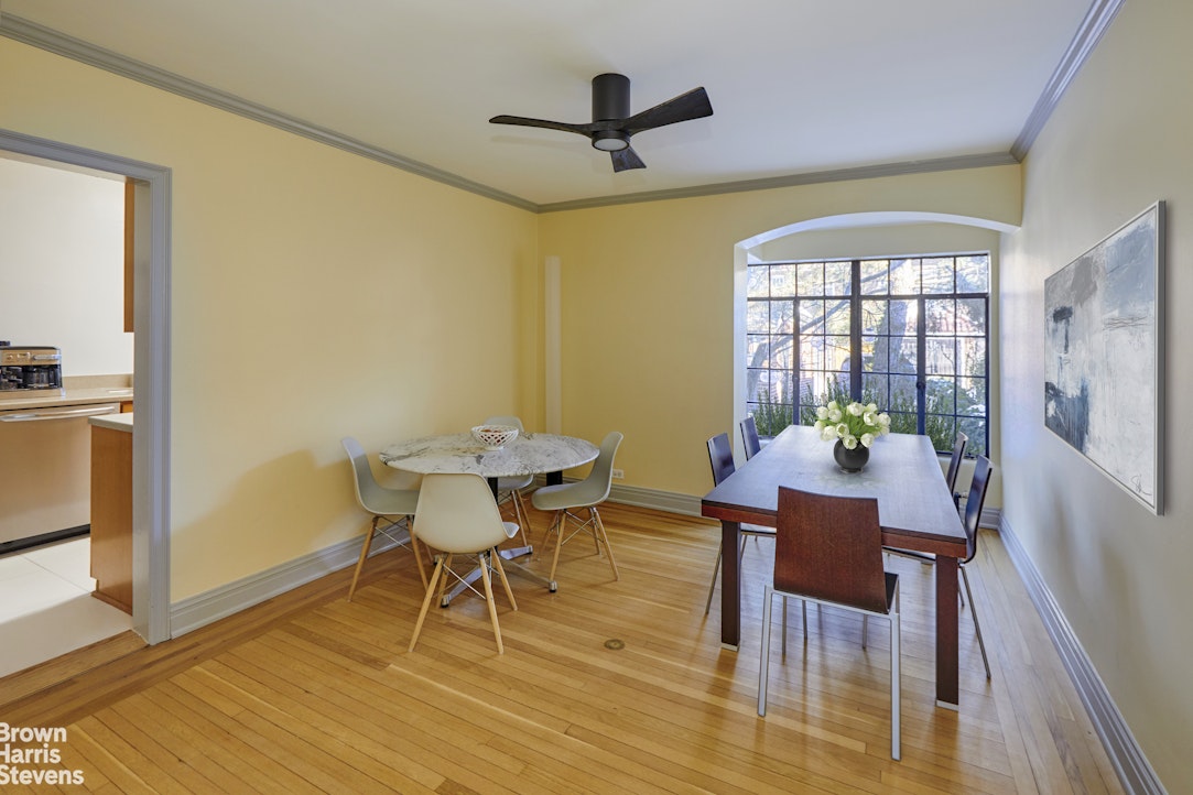 34-27 87th Street Queens, NY 11372 - Photo 4 of 19 a view of a dining room with furniture and wooden floor