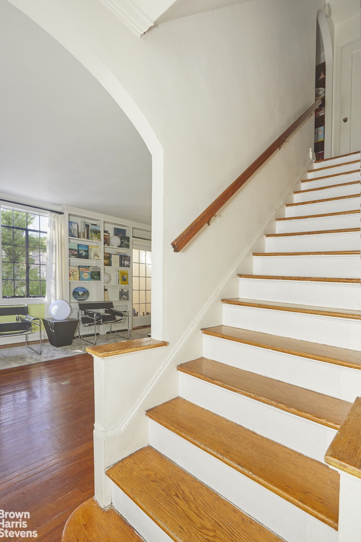34-27 87th Street Queens, NY 11372 - Photo 7 of 19 a view of entryway and hall with wooden floor