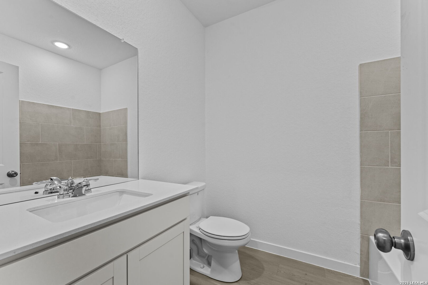2299 Fort Davis Pass Marion, TX 78124 - Photo 6 of 26 a bathroom with a sink toilet and vanity
