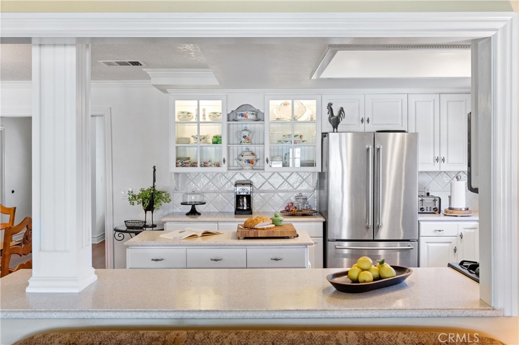 3527 Bluff Street Norco, CA 92860 - Photo 18 of 53 a living room with furniture and a table