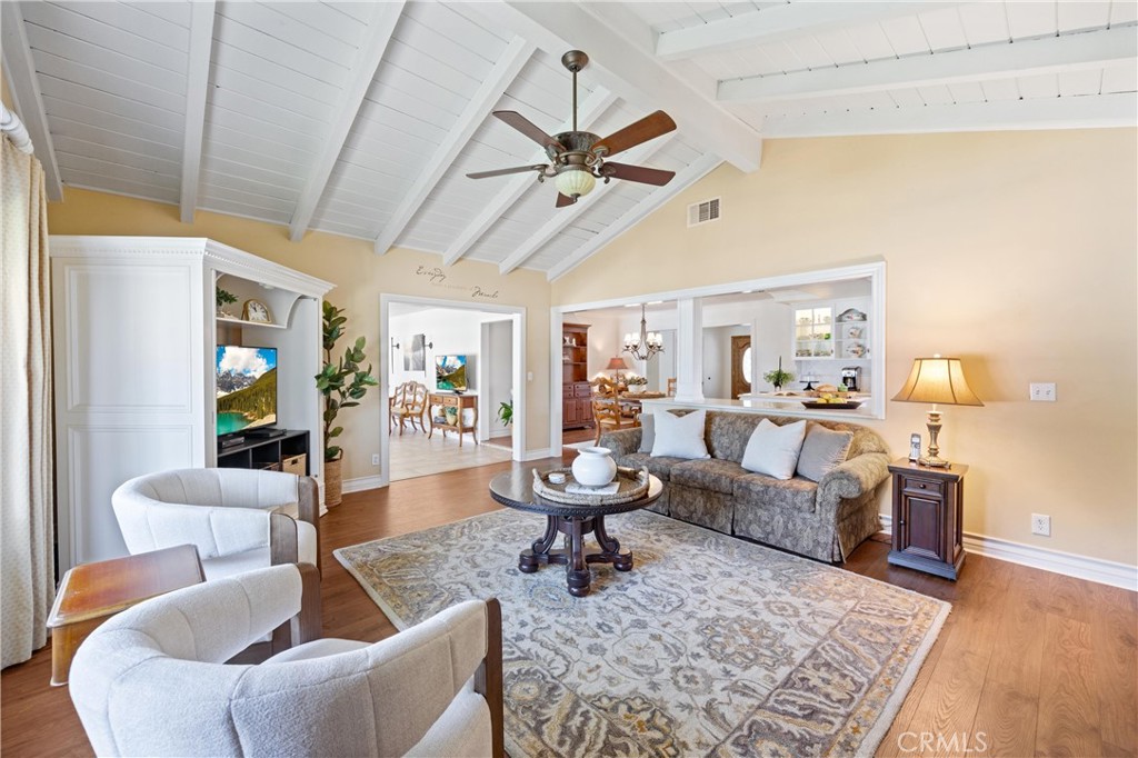 3527 Bluff Street Norco, CA 92860 - Photo 20 of 53 a living room with fireplace furniture and a rug