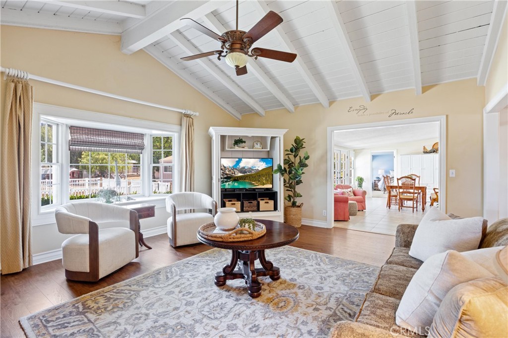 3527 Bluff Street Norco, CA 92860 - Photo 21 of 53 a living room with furniture a rug and a window