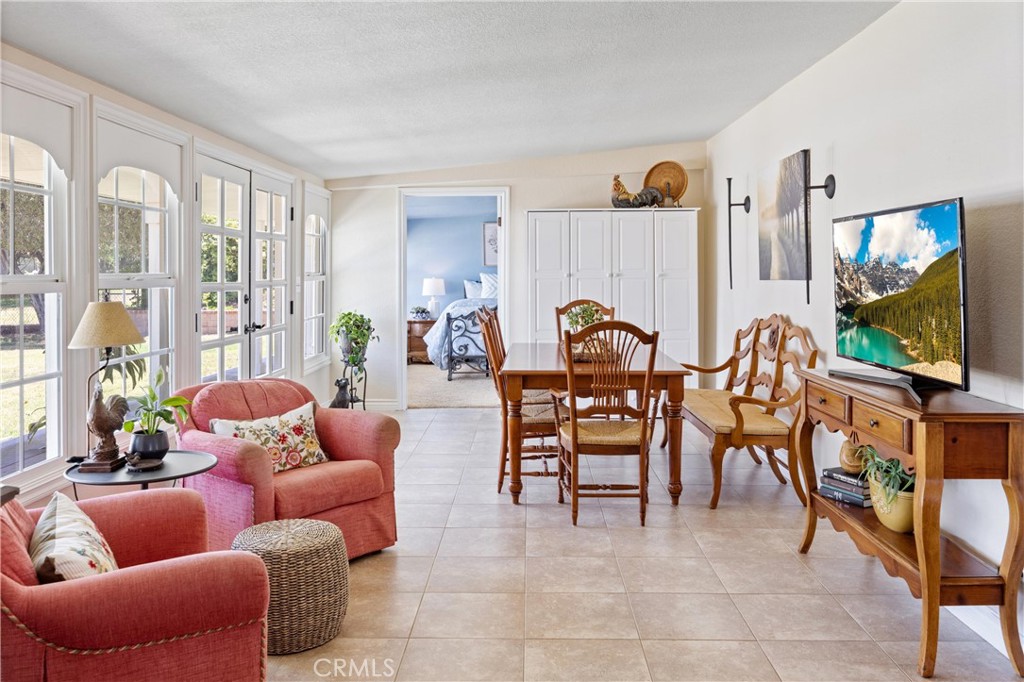 3527 Bluff Street Norco, CA 92860 - Photo 22 of 53 a living room with furniture and a flat screen tv