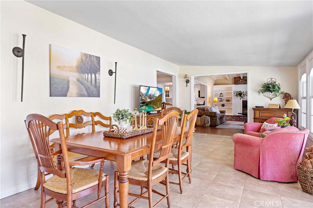 3527 Bluff Street Norco, CA 92860 - Photo 23 of 53 a dining room with furniture and window