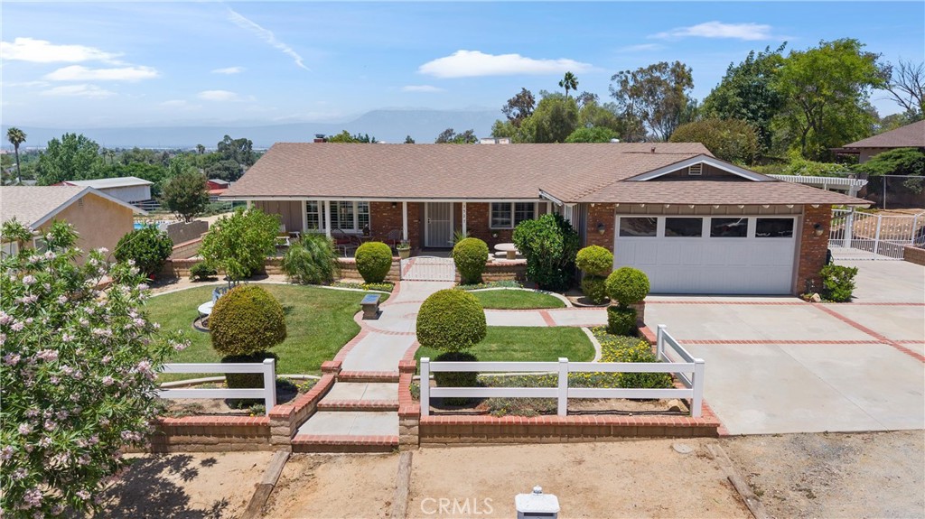3527 Bluff Street Norco, CA 92860 - Photo 3 of 53 a front view of a house with a yard