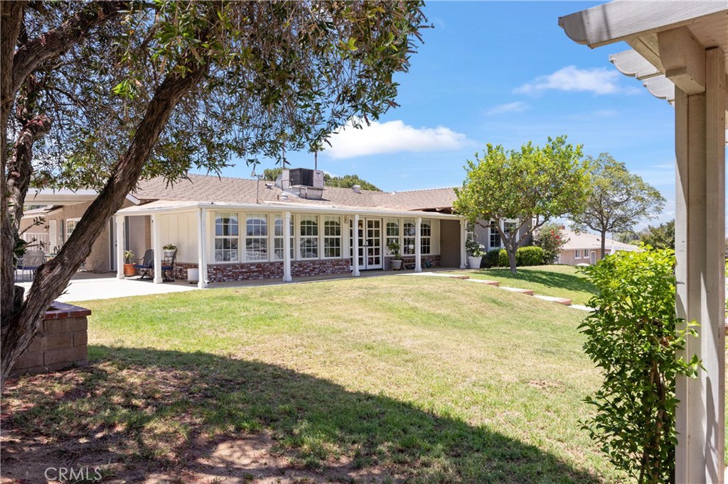 3527 Bluff Street Norco, CA 92860 - Photo 35 of 53 a front view of a house with a garden