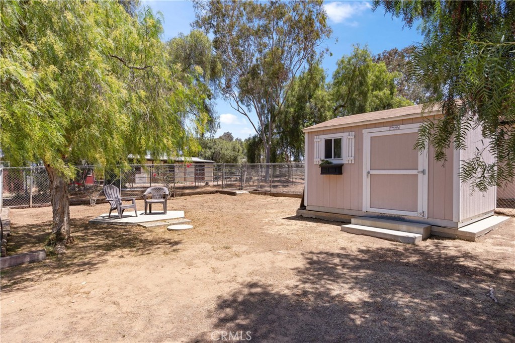 3527 Bluff Street Norco, CA 92860 - Photo 41 of 53 a view of a house with backyard and sitting area