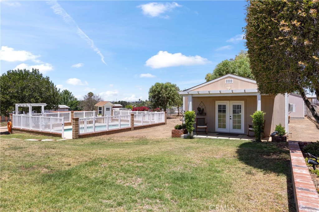 3527 Bluff Street Norco, CA 92860 - Photo 44 of 53 a view of a house with a yard porch and sitting area