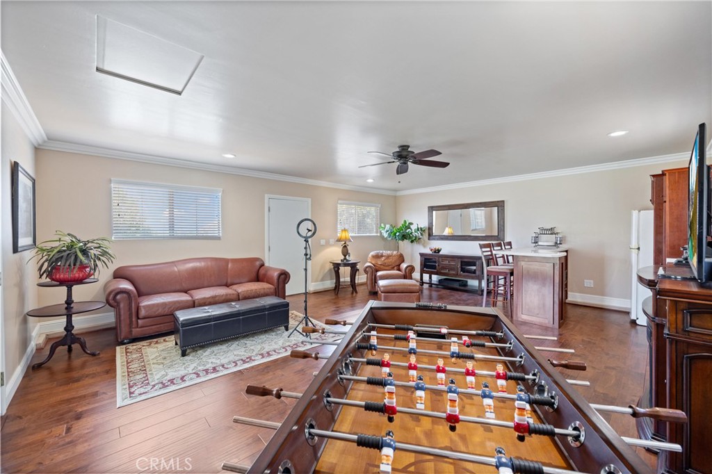 3527 Bluff Street Norco, CA 92860 - Photo 45 of 53 a living room with furniture and a rug