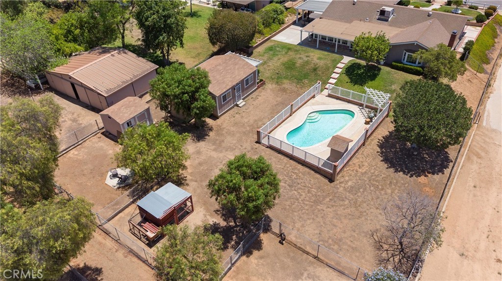 3527 Bluff Street Norco, CA 92860 - Photo 52 of 53 an aerial view of a house with a yard