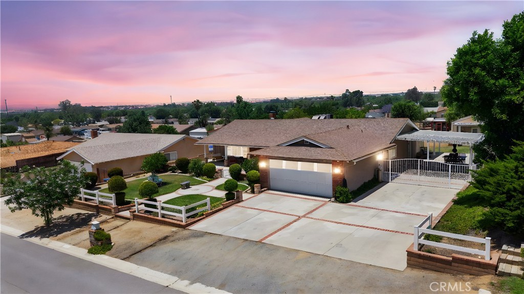3527 Bluff Street Norco, CA 92860 - Photo 53 of 53 a aerial view of a house with a garden and plants