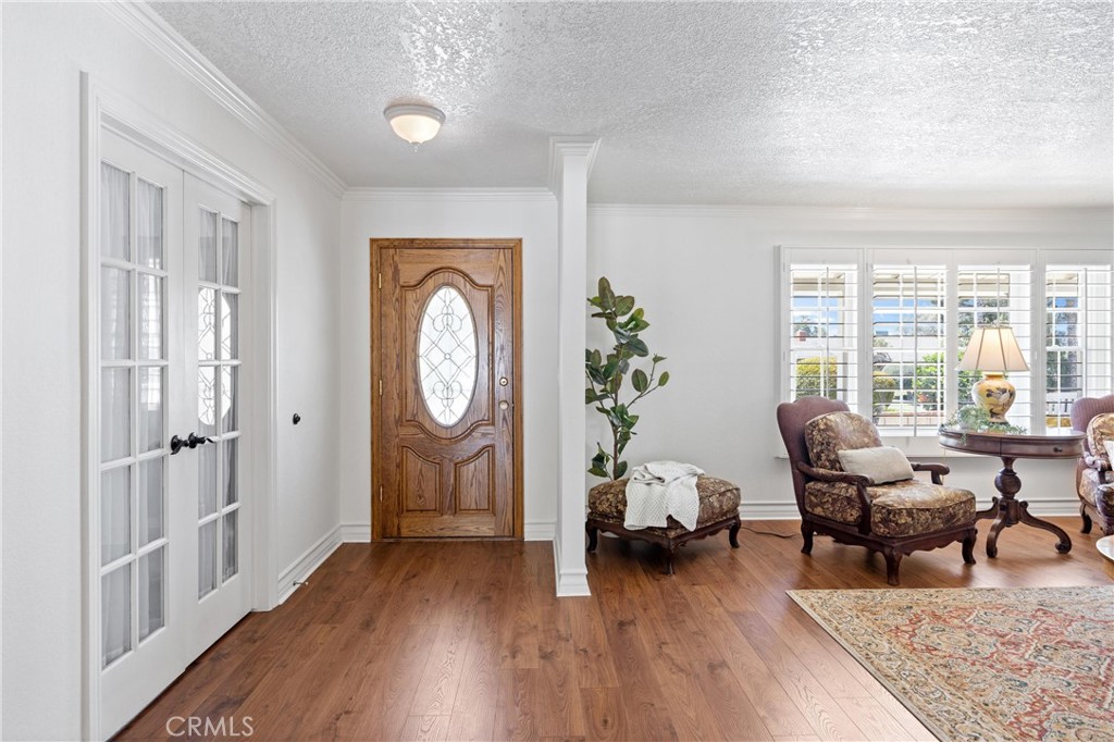3527 Bluff Street Norco, CA 92860 - Photo 6 of 53 a living room with furniture and wooden floor