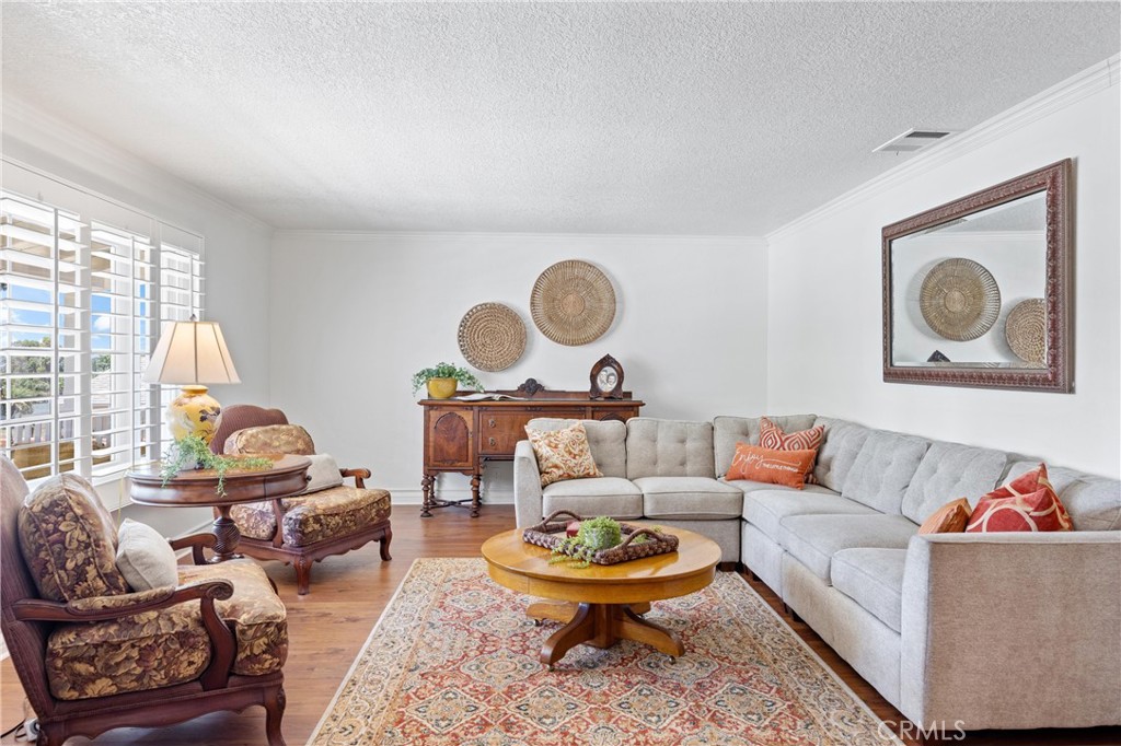 3527 Bluff Street Norco, CA 92860 - Photo 8 of 53 a living room with furniture and a large window