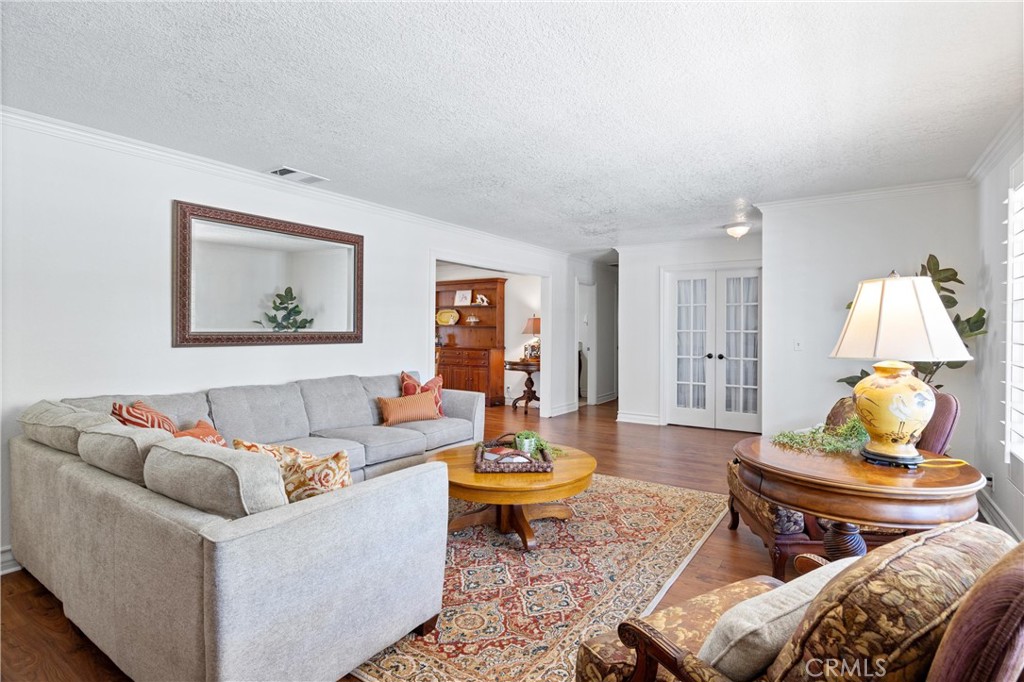 3527 Bluff Street Norco, CA 92860 - Photo 9 of 53 a living room with furniture and wooden floor