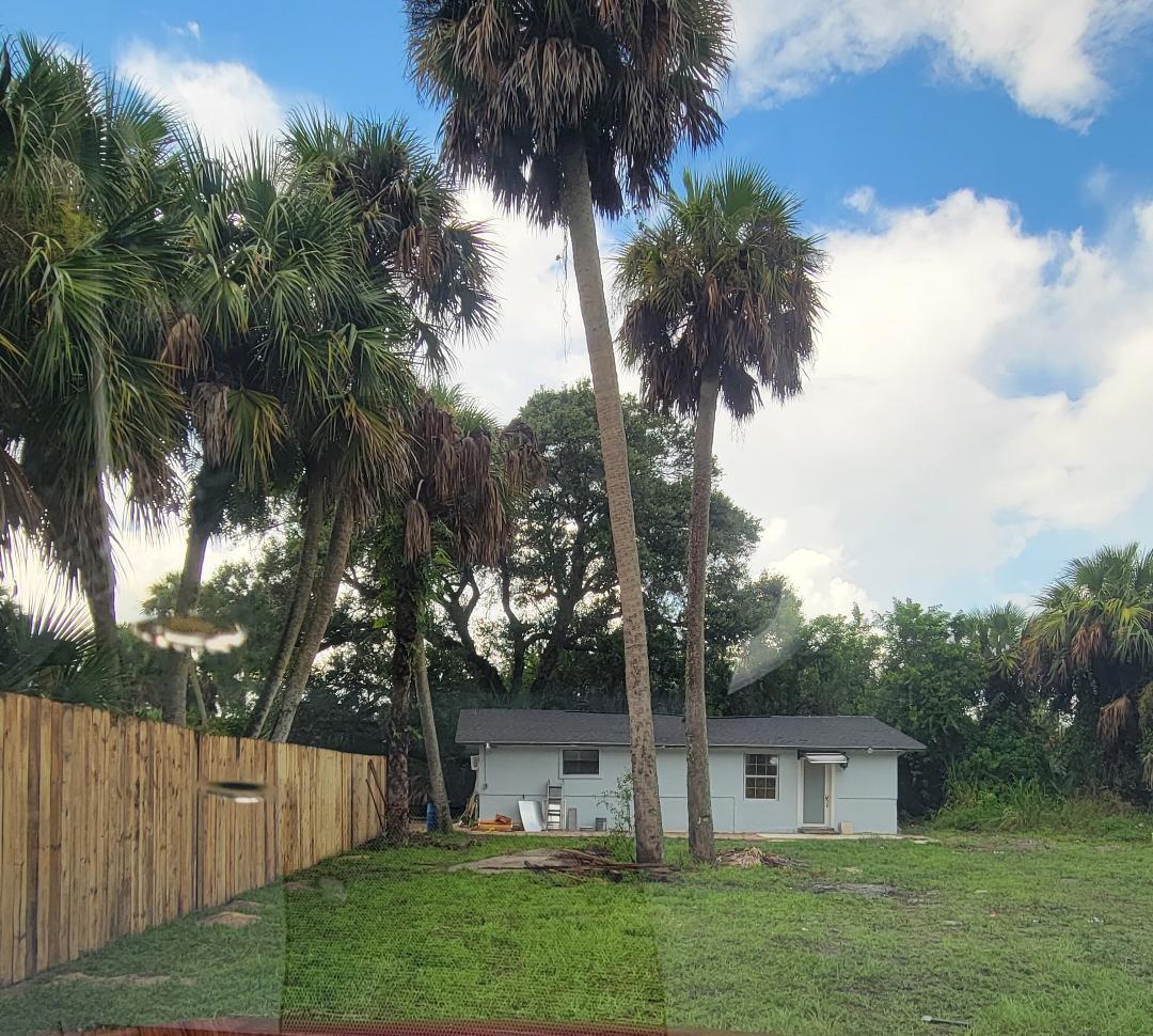 5728 St Lucie Boulevard, Unit REAR HOUSE Fort Pierce, FL 34946 - Photo 1 of 22 a view of a back yard