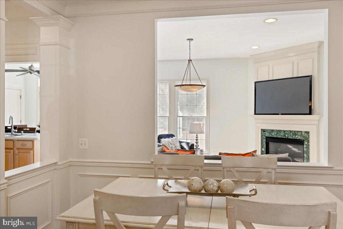 22 Maidenhead Road Princeton, NJ 08540 - Photo 7 of 31 a living room with fireplace furniture and a flat screen tv