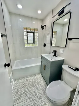 a utility room with washer and dryer