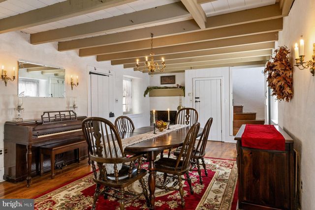 a view of kitchen and wooden floor