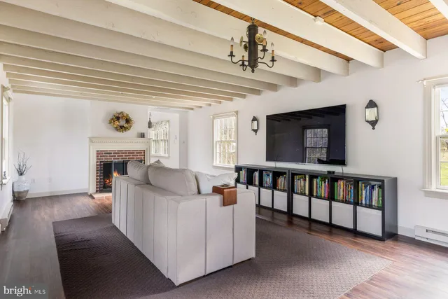 a room with furniture and a window