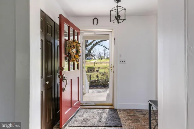 a kitchen with stainless steel appliances a stove a sink and a microwave