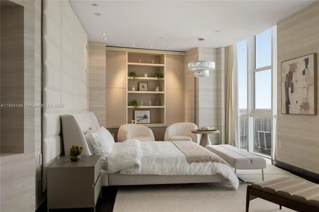 a bedroom with two beds and painted walls