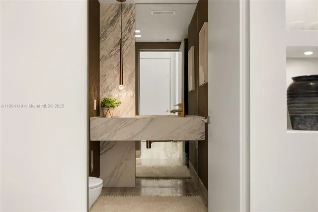 a bedroom with a bed and a wall painting