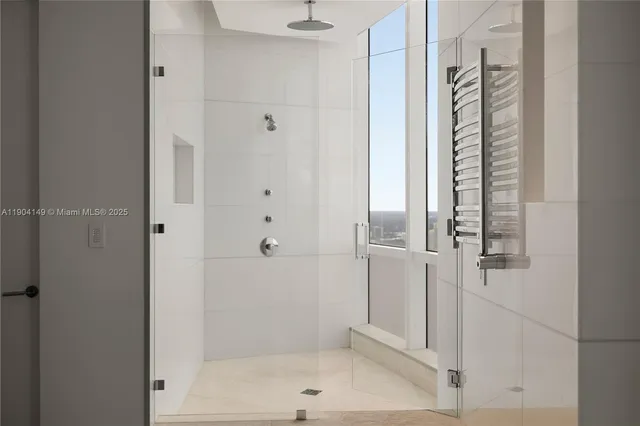 a bedroom with a bed and a table in it