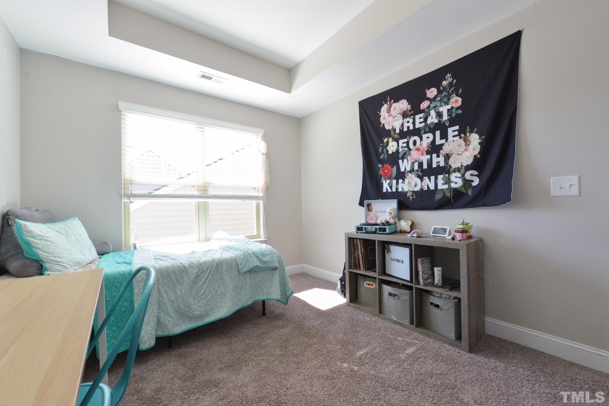 60 Mariners Point Way Garner, NC 27529 - Photo 35 of 43 a bed room with a bed and a window