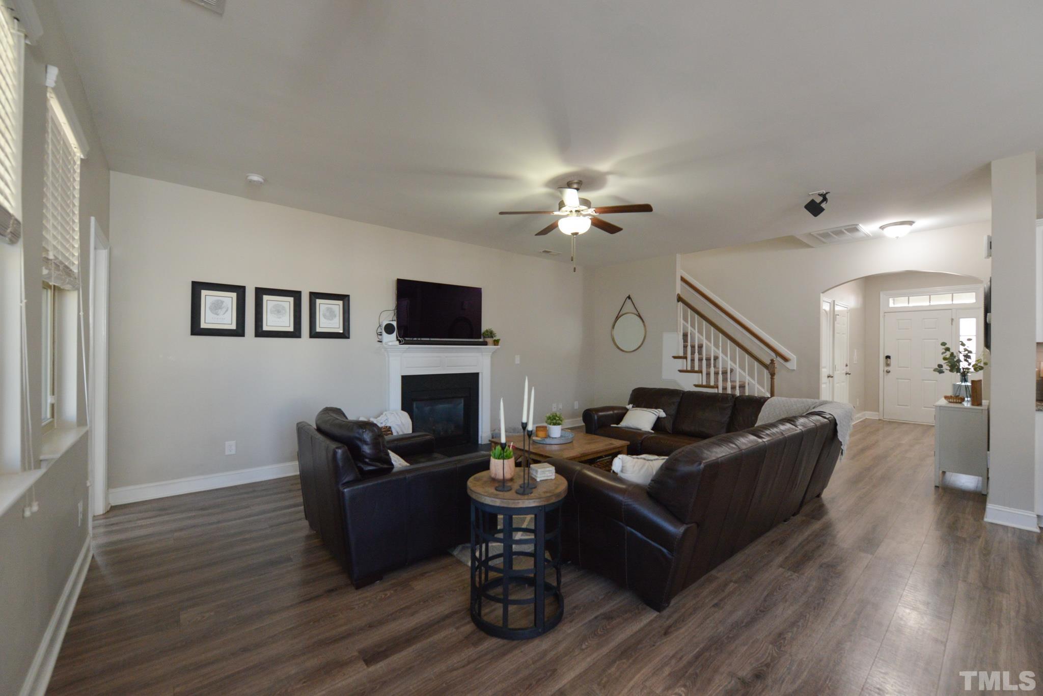 60 Mariners Point Way Garner, NC 27529 - Photo 7 of 43 a living room with furniture and a fireplace