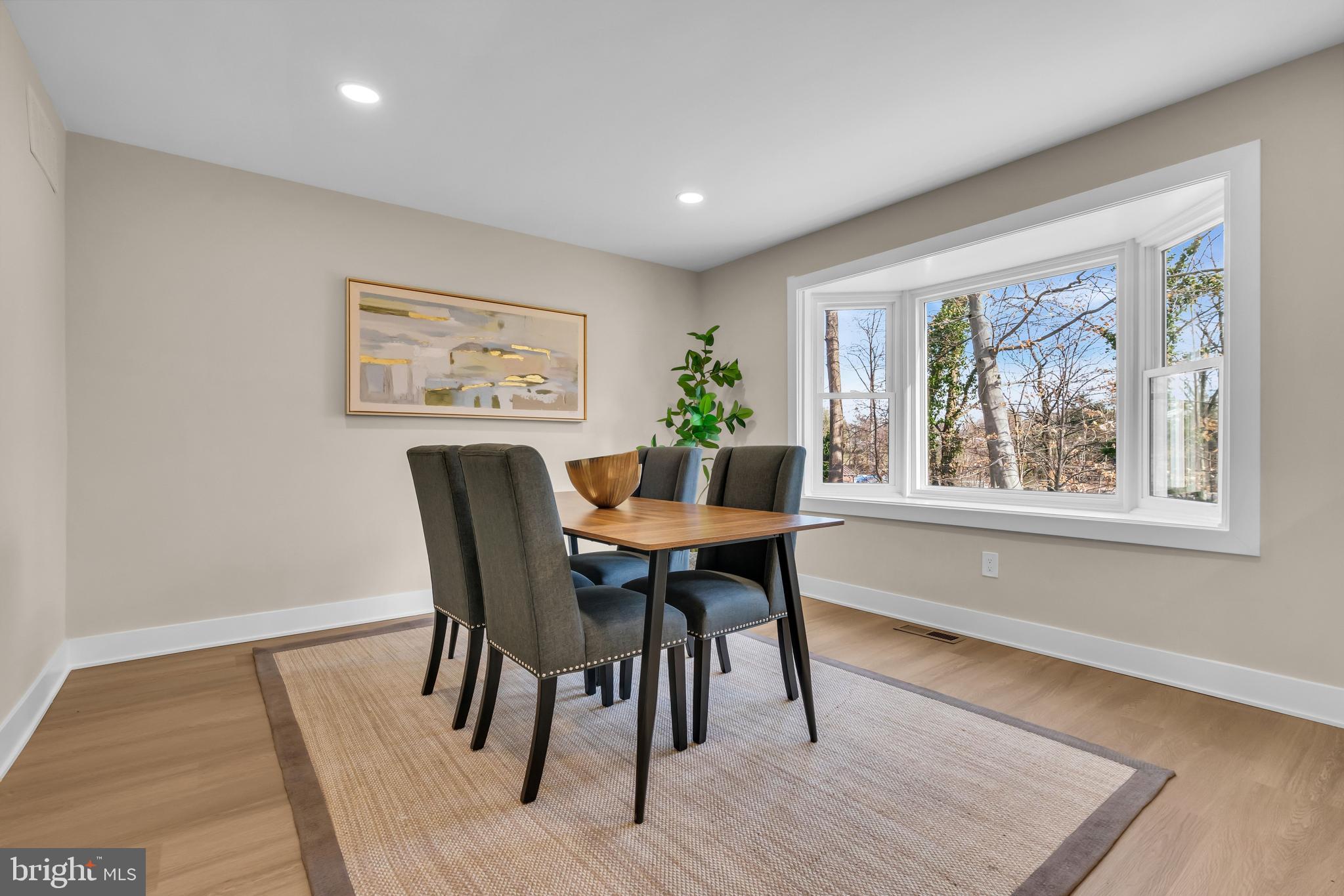 2227 Sand Trap Road Jamison, PA 18929 - Photo 16 of 79 a view of a dining room with furniture window and wooden floor