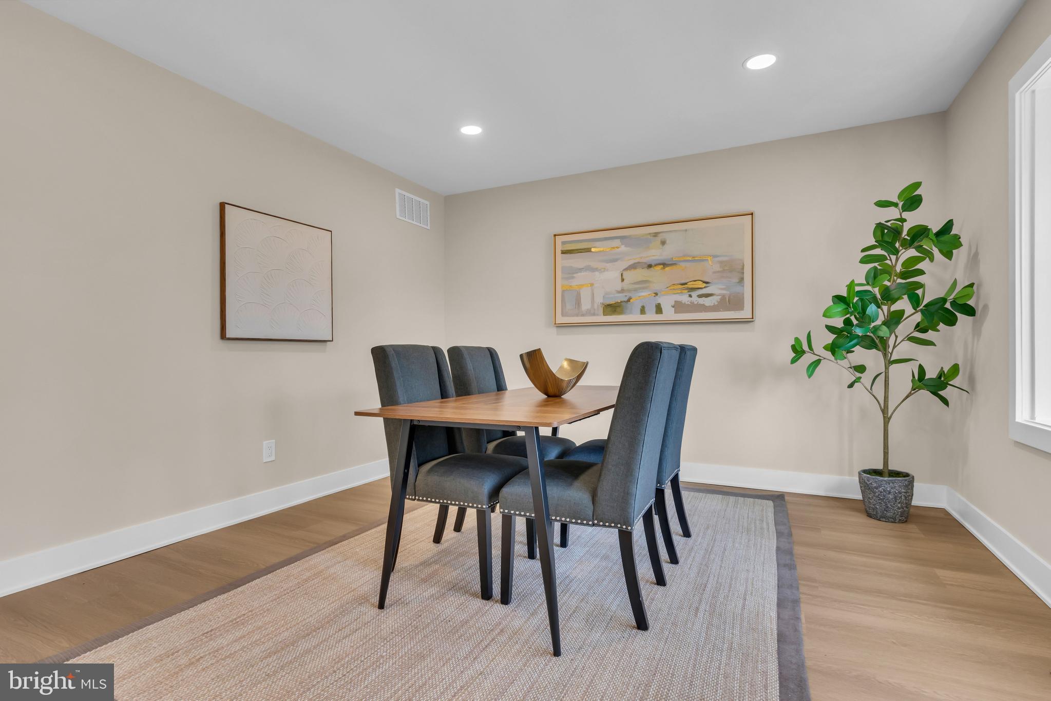 2227 Sand Trap Road Jamison, PA 18929 - Photo 17 of 79 a view of a dining room with furniture and wooden floor