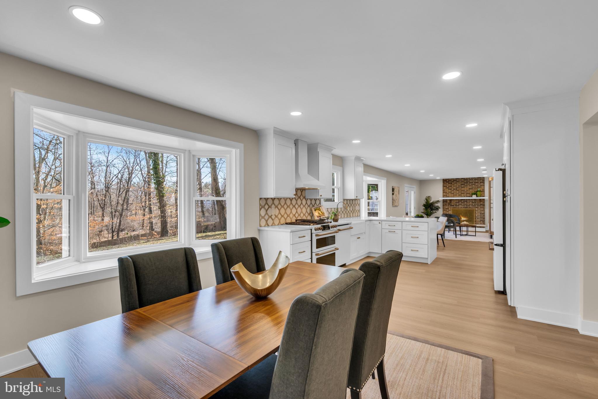2227 Sand Trap Road Jamison, PA 18929 - Photo 18 of 79 a view of a dining room with furniture window and wooden floor