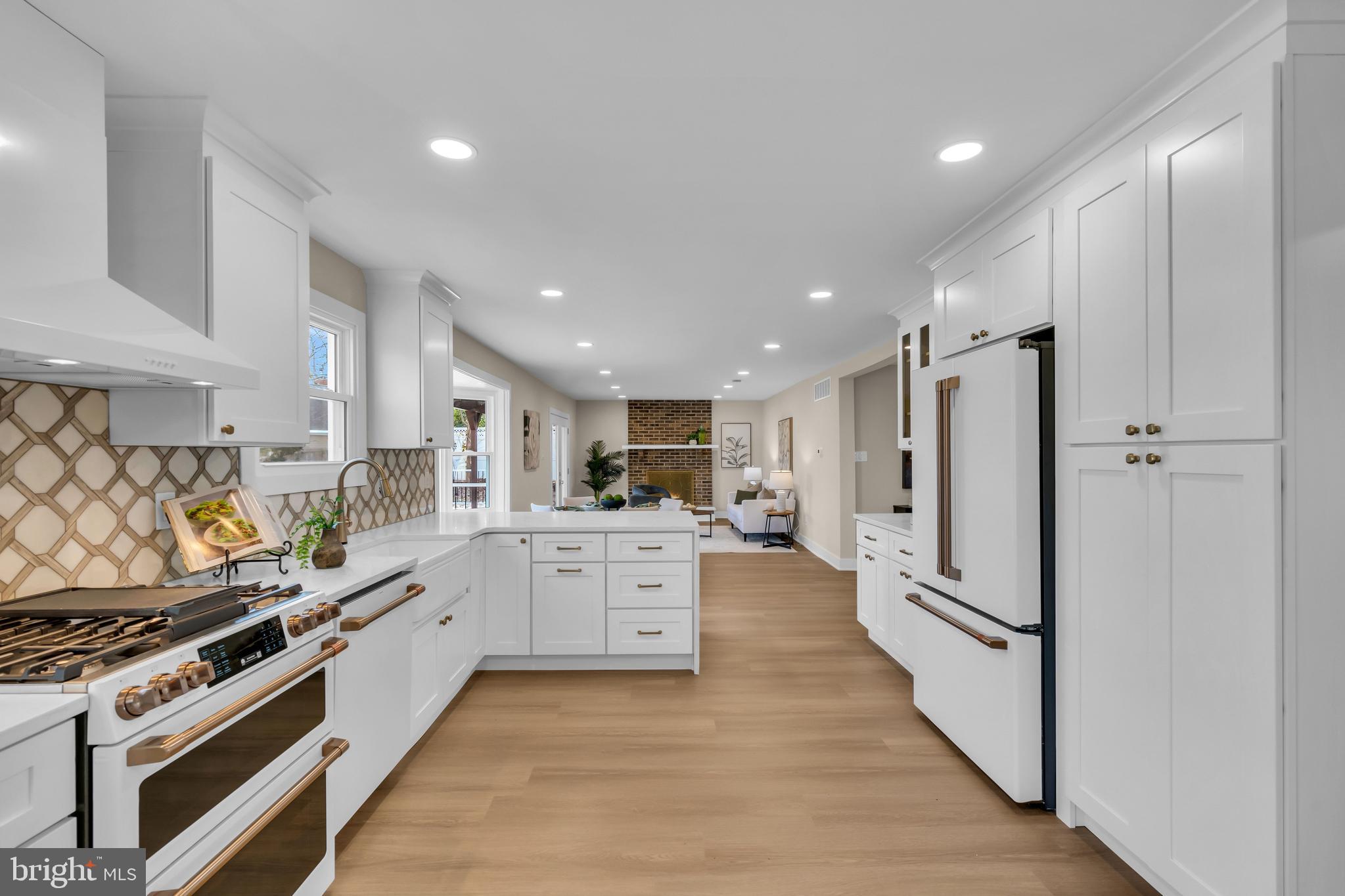 2227 Sand Trap Road Jamison, PA 18929 - Photo 24 of 79 a kitchen with stainless steel appliances a stove a sink and a refrigerator