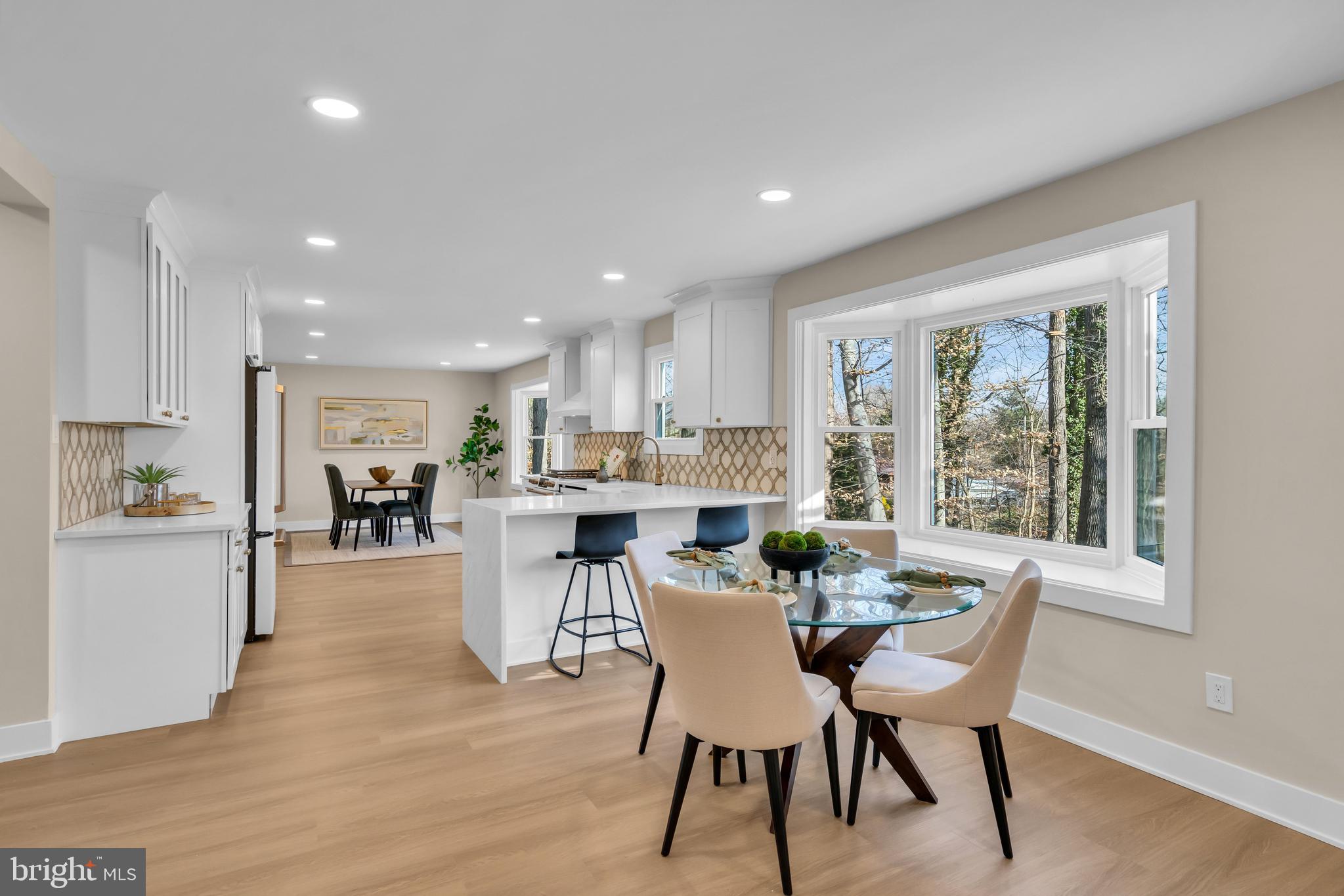 2227 Sand Trap Road Jamison, PA 18929 - Photo 29 of 79 a view of a dining room with furniture window and wooden floor