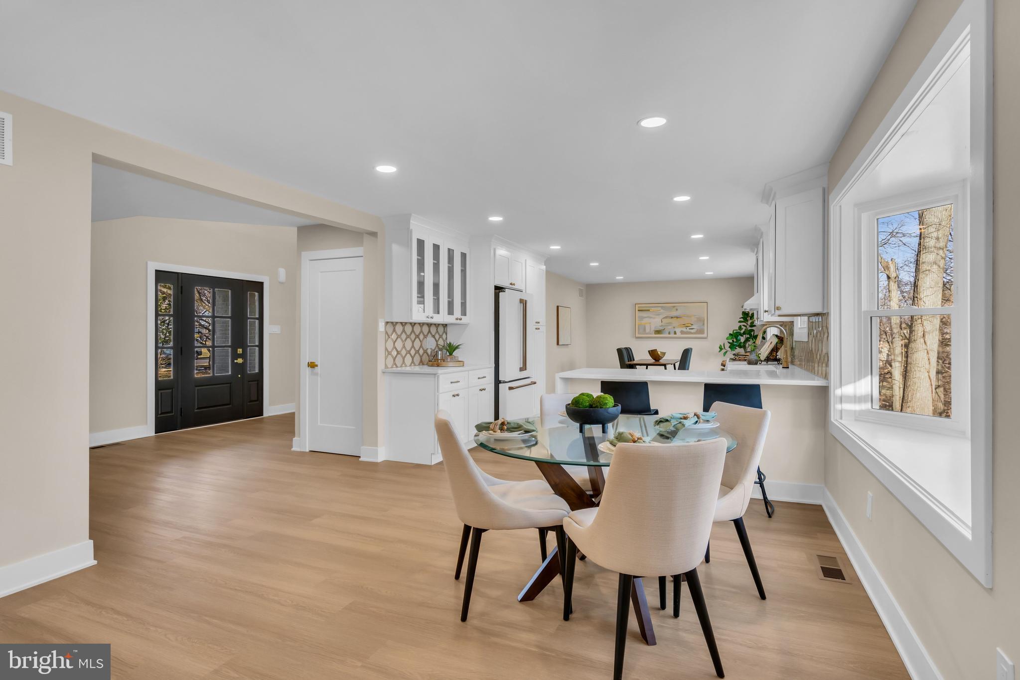 2227 Sand Trap Road Jamison, PA 18929 - Photo 30 of 79 a view of a dining room with furniture and wooden floor