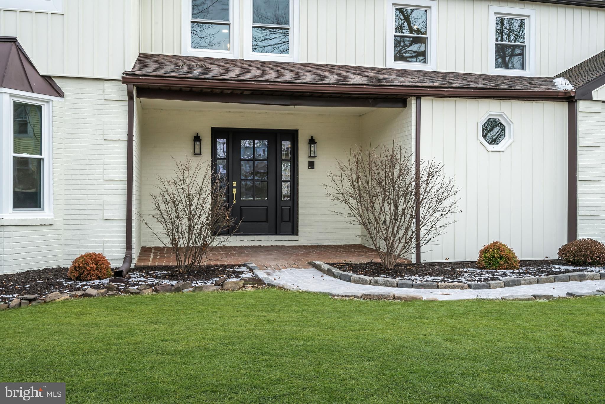 2227 Sand Trap Road Jamison, PA 18929 - Photo 4 of 79 a view of front door and potted plants