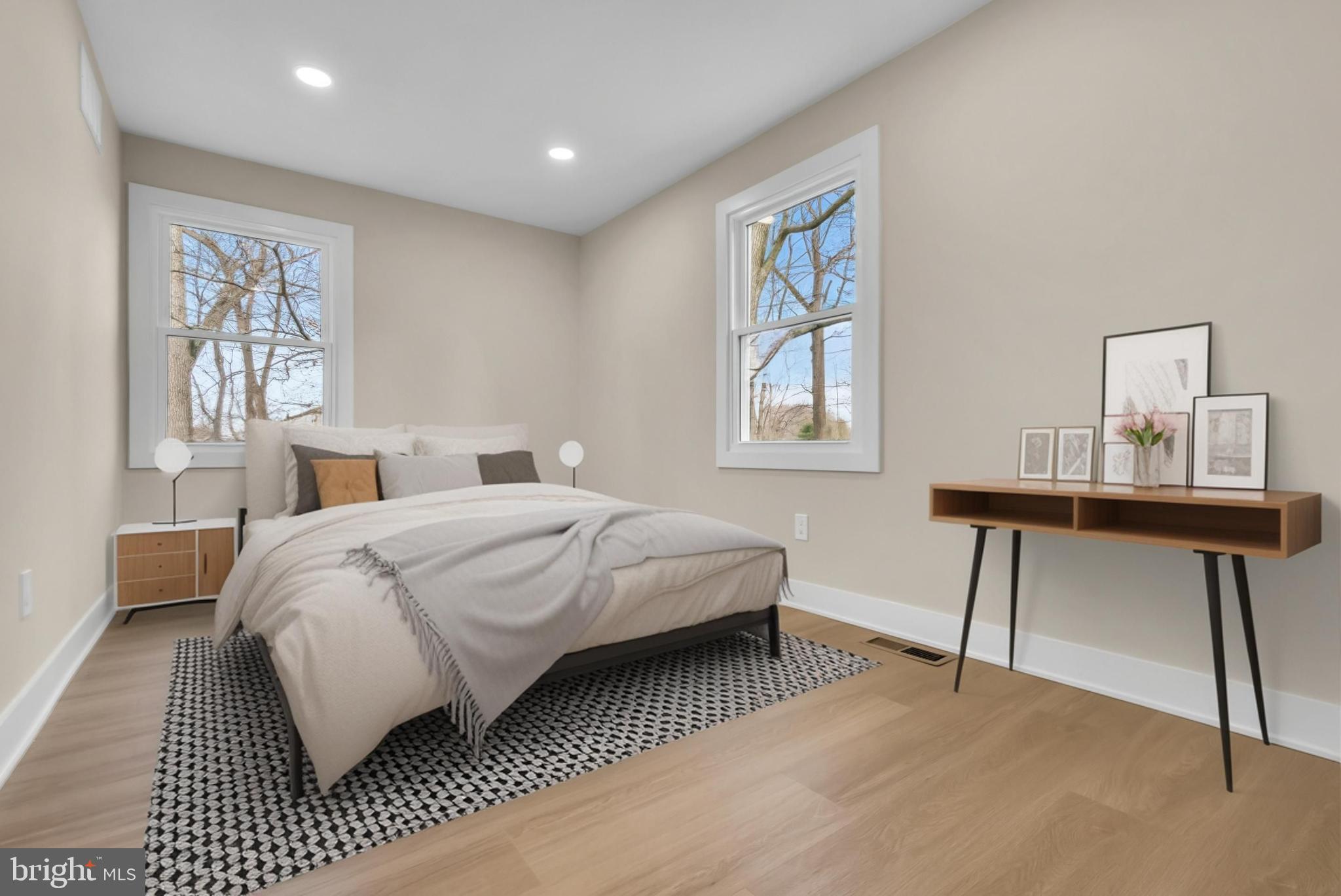 2227 Sand Trap Road Jamison, PA 18929 - Photo 45 of 79 a bedroom with a bed and a table in it