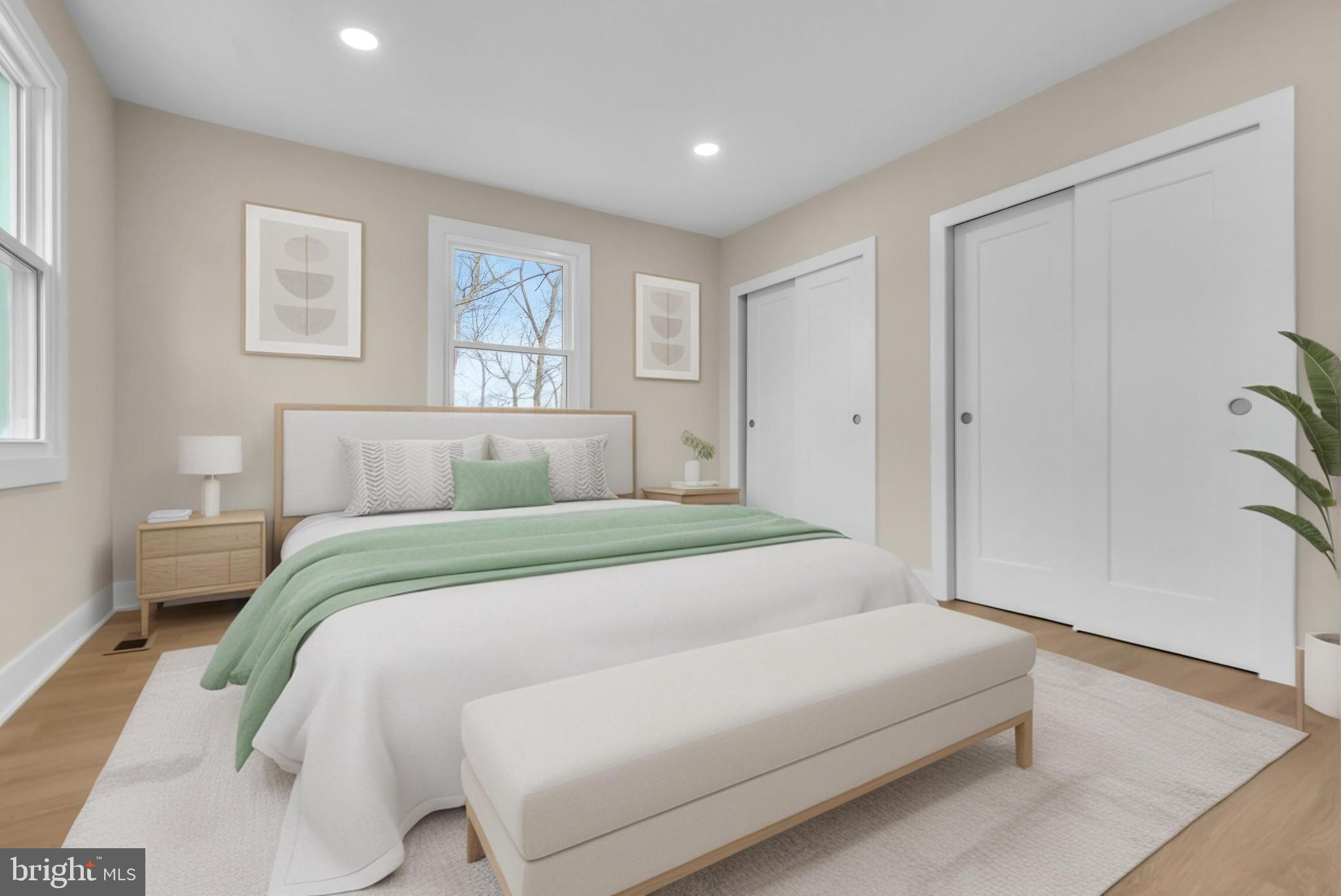 2227 Sand Trap Road Jamison, PA 18929 - Photo 46 of 79 a bedroom with a large bed and a couch