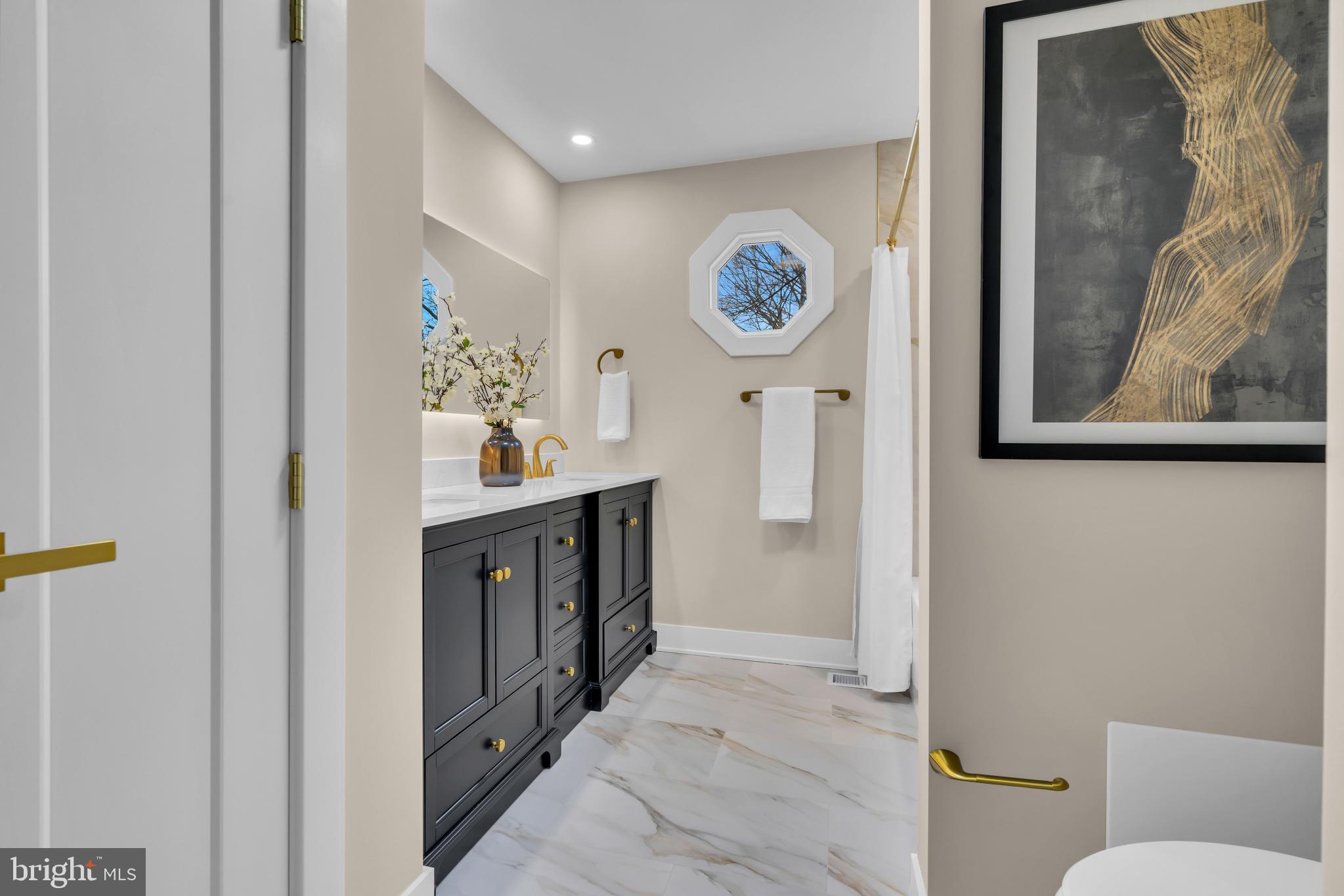 2227 Sand Trap Road Jamison, PA 18929 - Photo 47 of 79 a bathroom with a sink and a mirror
