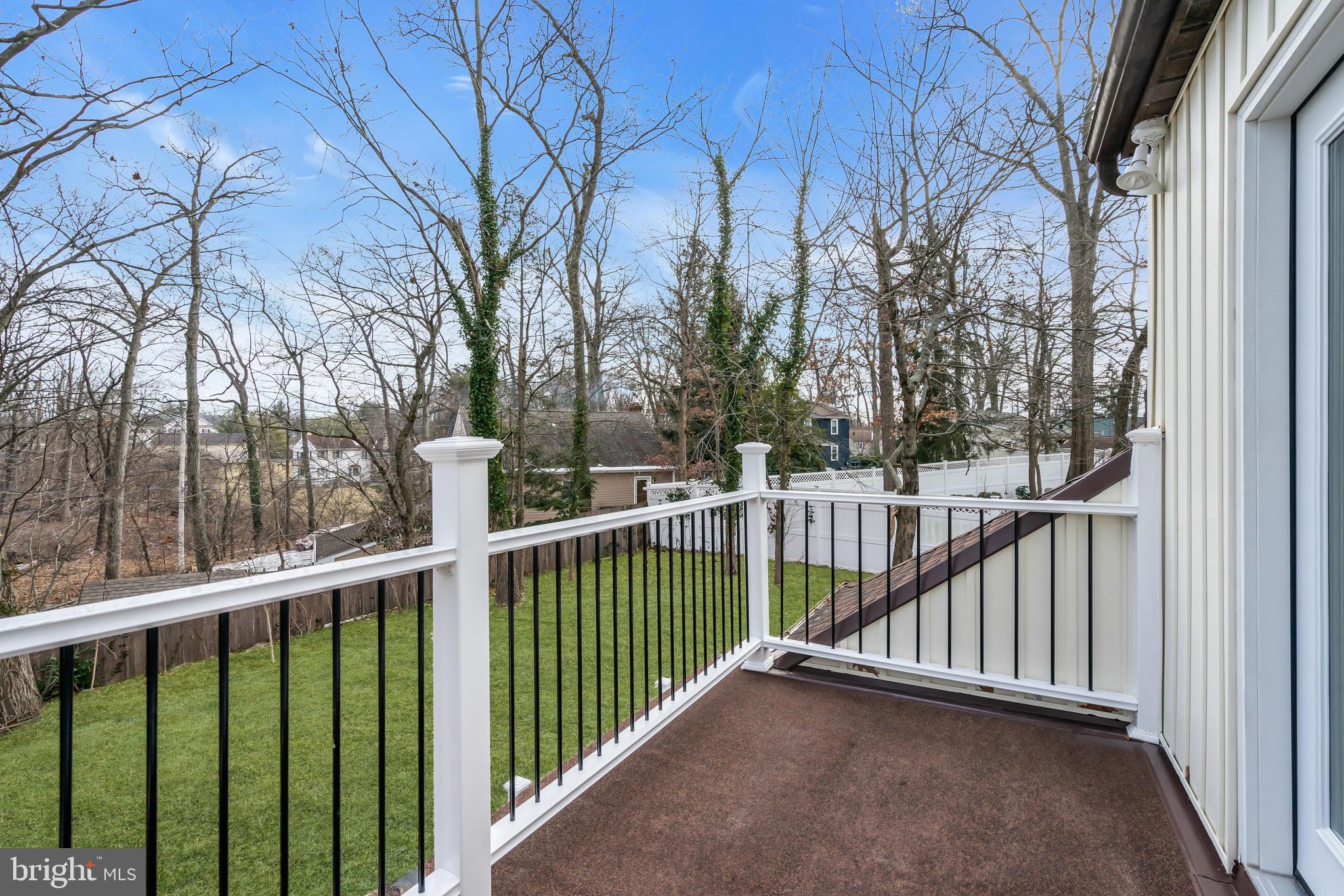 2227 Sand Trap Road Jamison, PA 18929 - Photo 57 of 79 a view of a balcony with wooden fence and floor