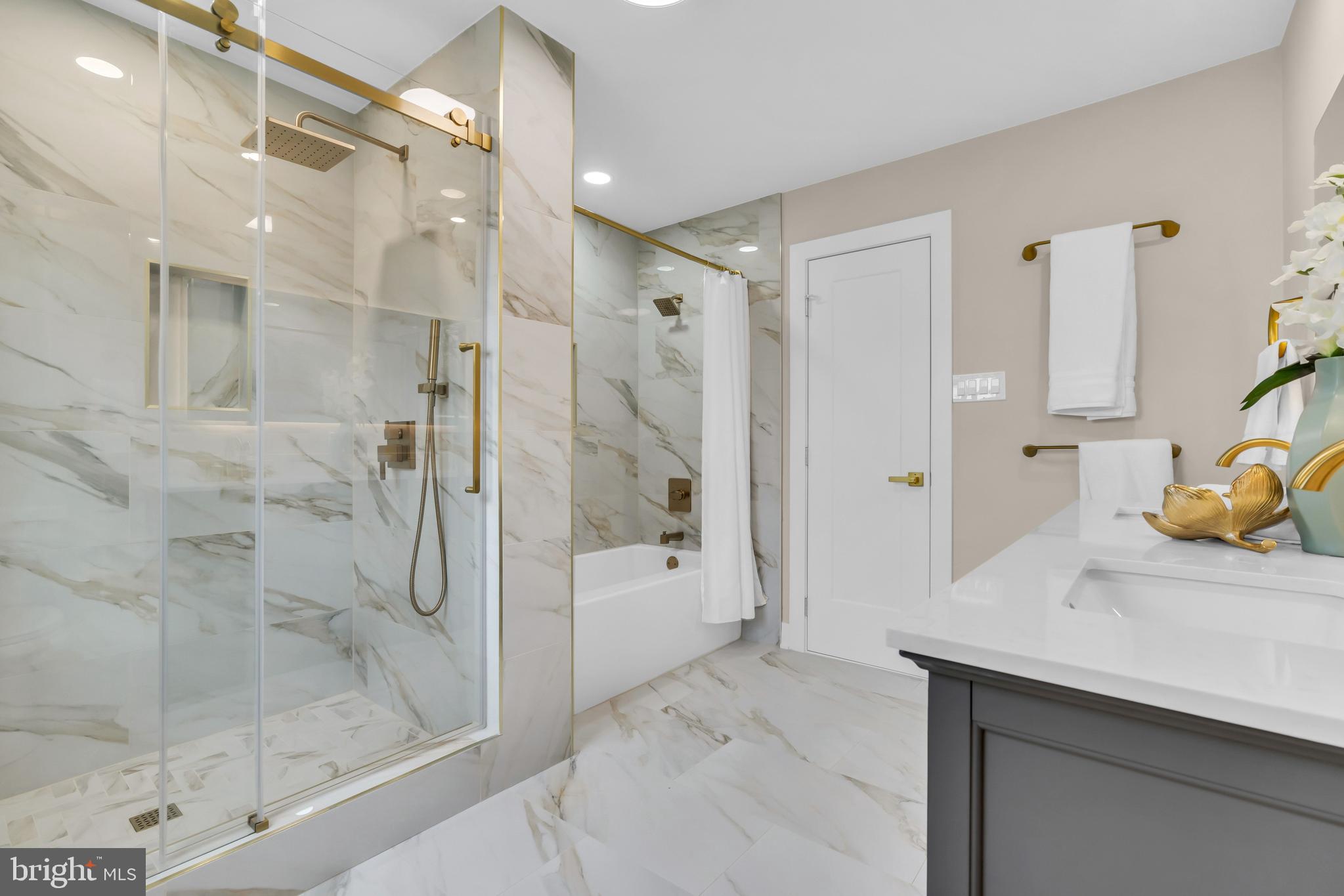 2227 Sand Trap Road Jamison, PA 18929 - Photo 61 of 79 a bathroom with a shower sink and mirror