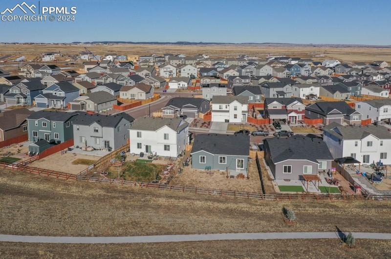 10480 Summer Ridge Drive Peyton, CO 80831 - Photo 13 of 30 an aerial view of residential houses with outdoor space