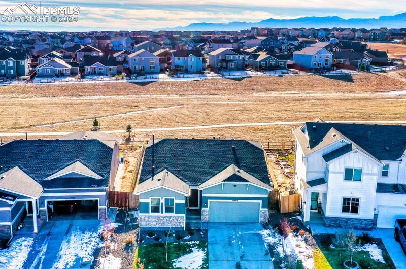10480 Summer Ridge Drive Peyton, CO 80831 - Photo 15 of 30 a view of multiple houses with a yard