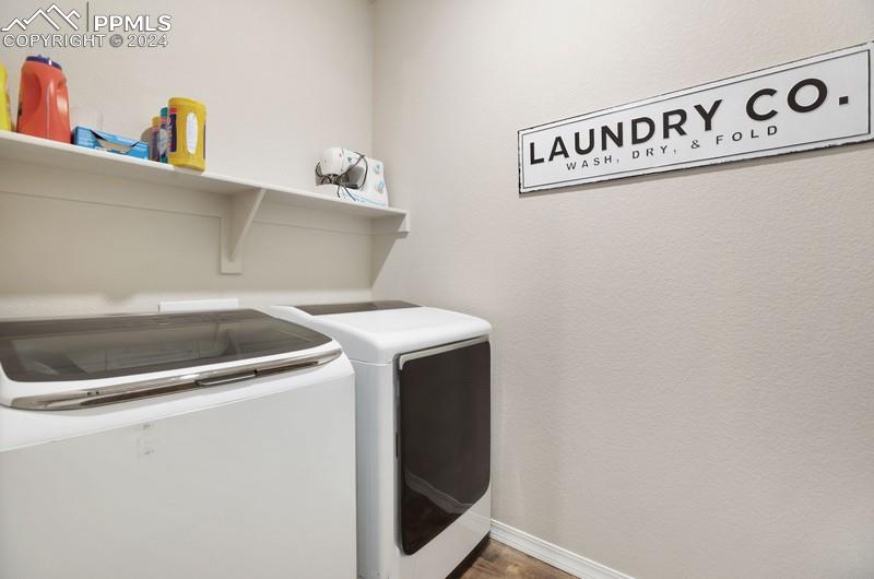 10480 Summer Ridge Drive Peyton, CO 80831 - Photo 20 of 30 a utility room with dryer and washer