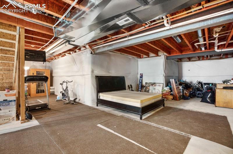 10480 Summer Ridge Drive Peyton, CO 80831 - Photo 29 of 30 a view of a room with gym equipment