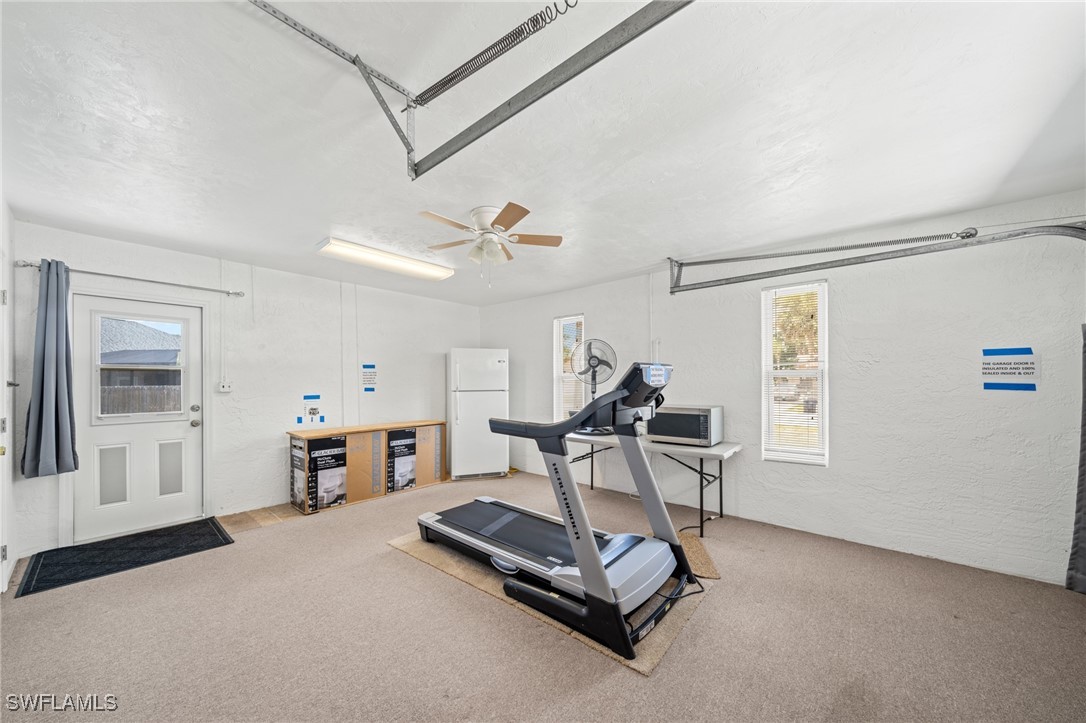 2551 Barcelona Avenue Fort Myers, FL 33905 - Photo 24 of 41 a living room with furniture a air conditioner vent and a window
