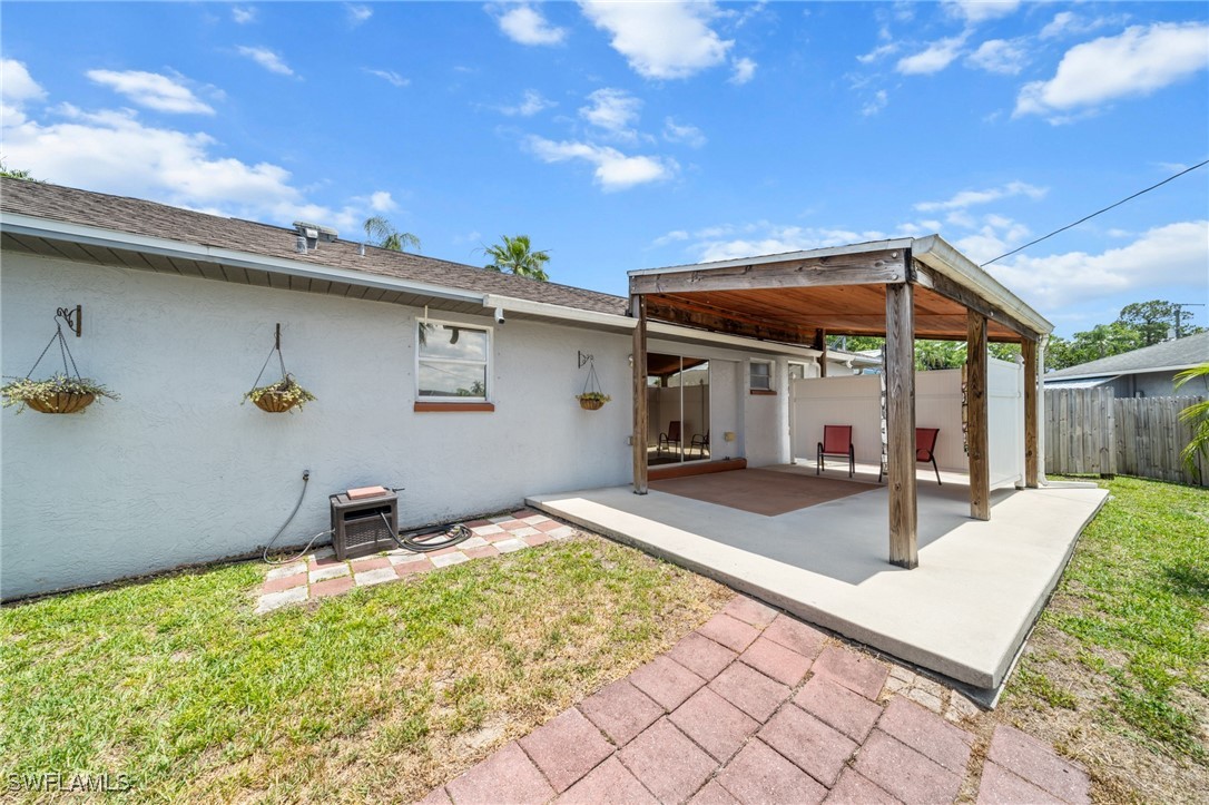 2551 Barcelona Avenue Fort Myers, FL 33905 - Photo 27 of 41 a view of a house with backyard