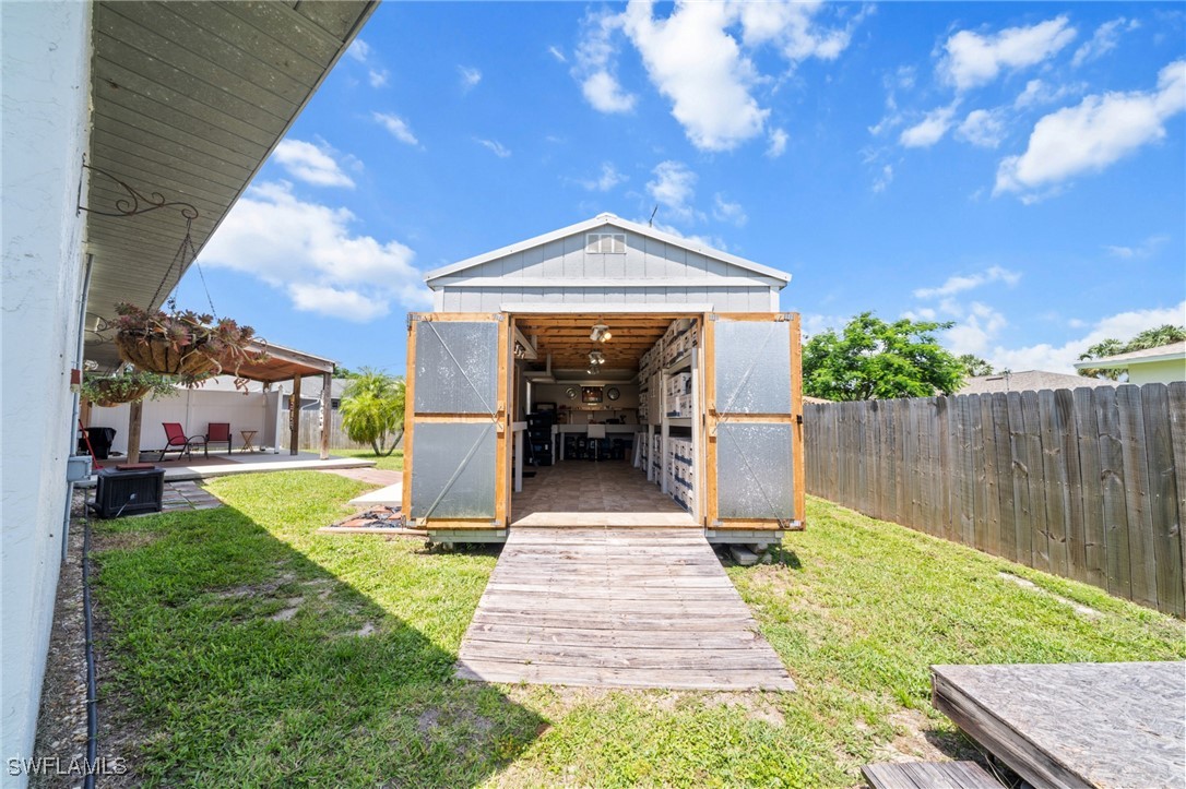 2551 Barcelona Avenue Fort Myers, FL 33905 - Photo 29 of 41 a front view of a house with garden