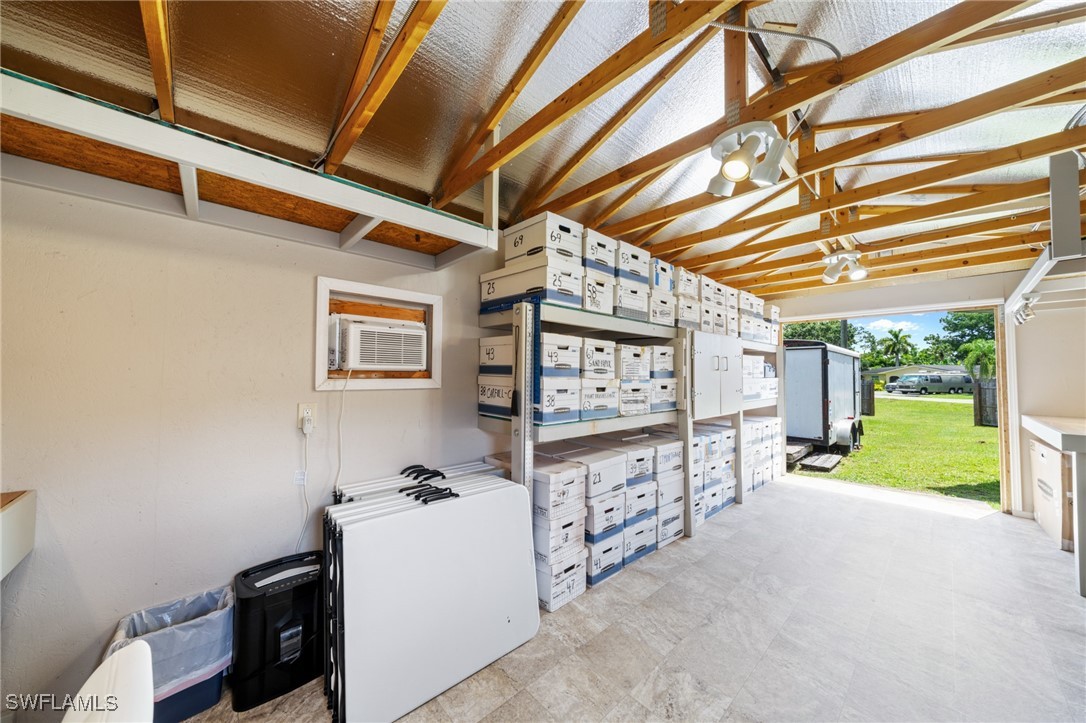 2551 Barcelona Avenue Fort Myers, FL 33905 - Photo 32 of 41 a view of a porch with furniture and garden