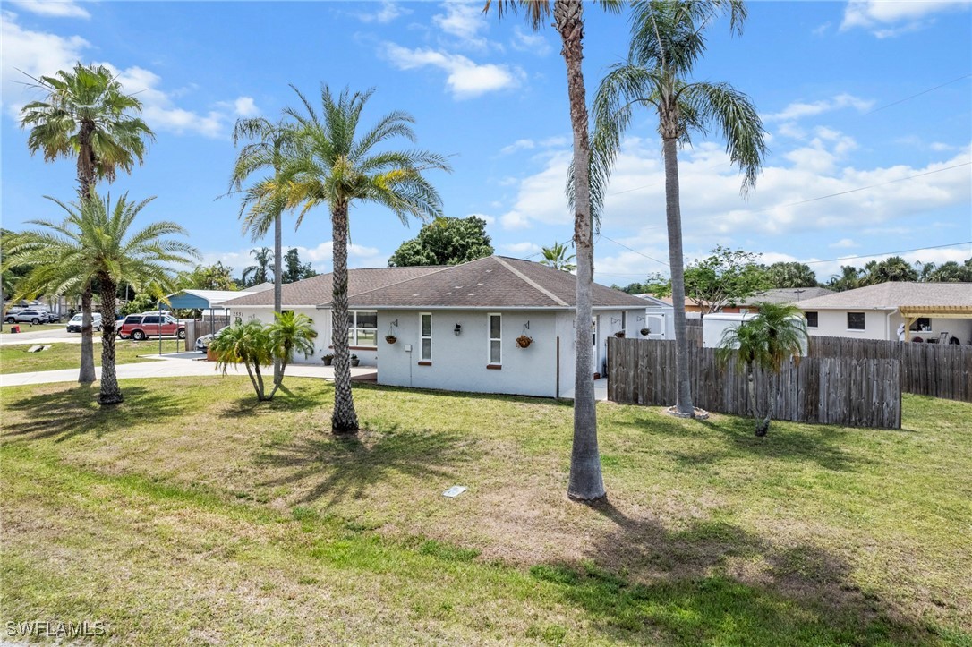 2551 Barcelona Avenue Fort Myers, FL 33905 - Photo 41 of 41 a house with palm tree in front of it